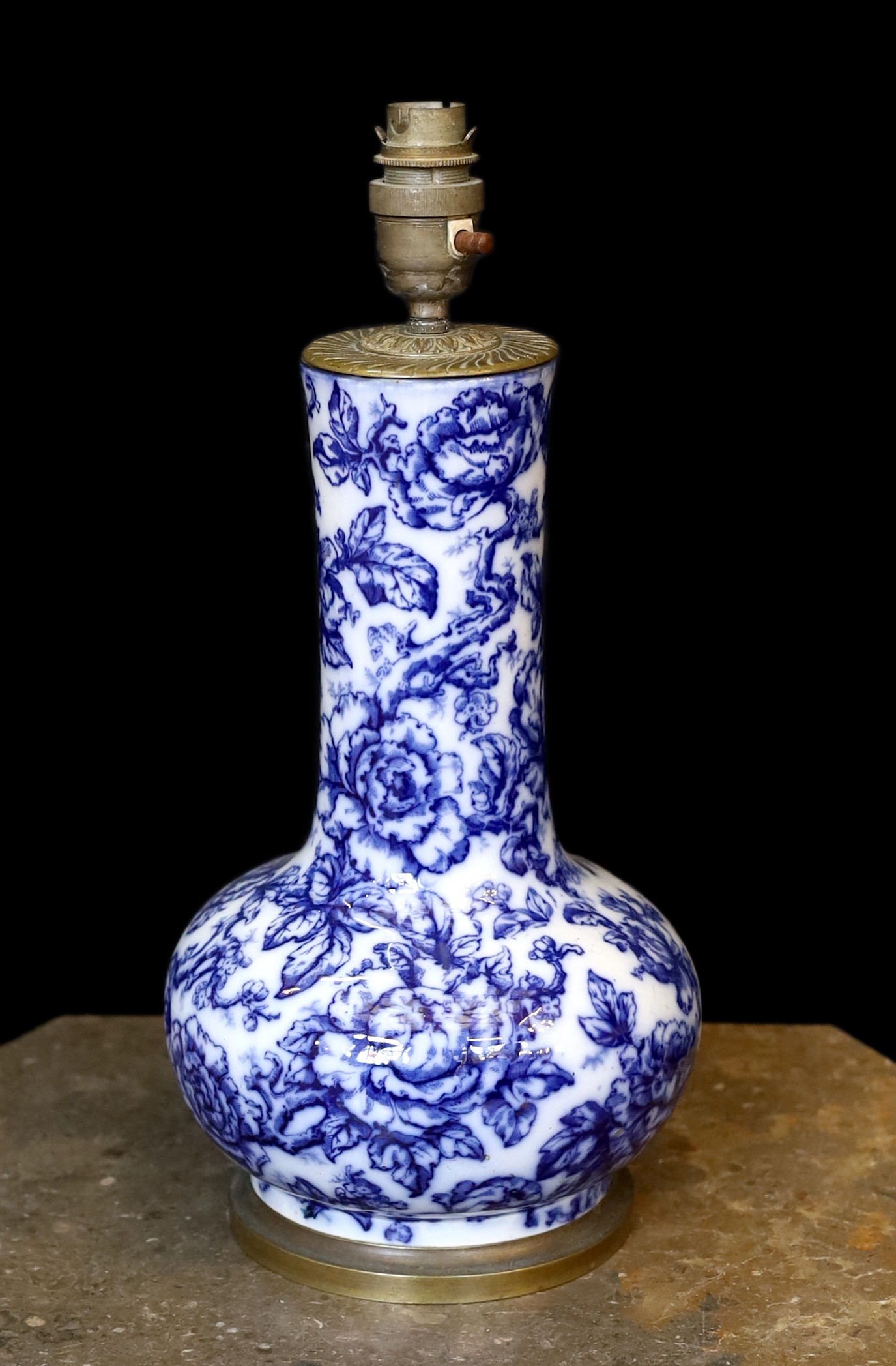 A Victorian mounted blue and white ceramic lamp base, height 38cm